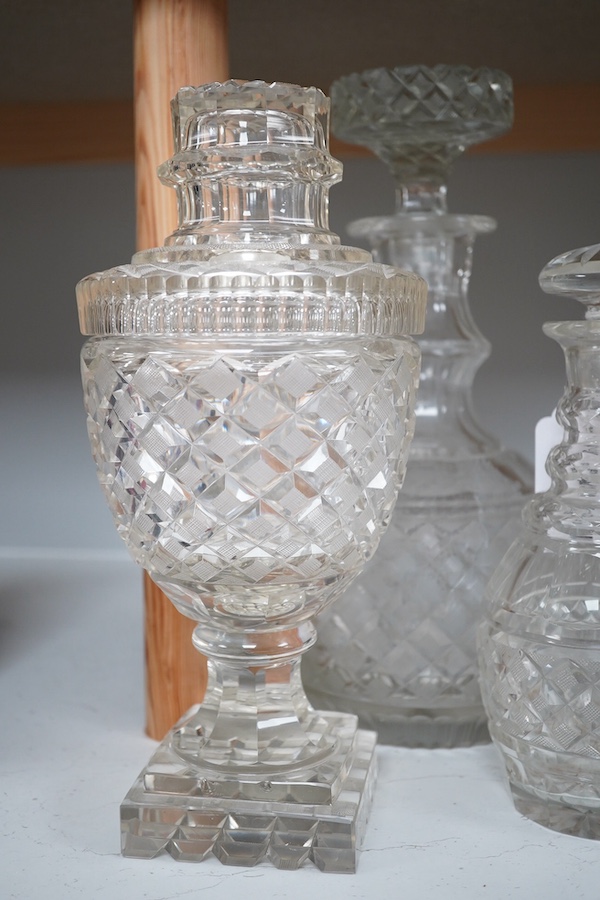 Voneche cut glass - a pair of large decanters, a pair of lidded urns and another decanter, 30cm. Condition- fair to good, several minor chips